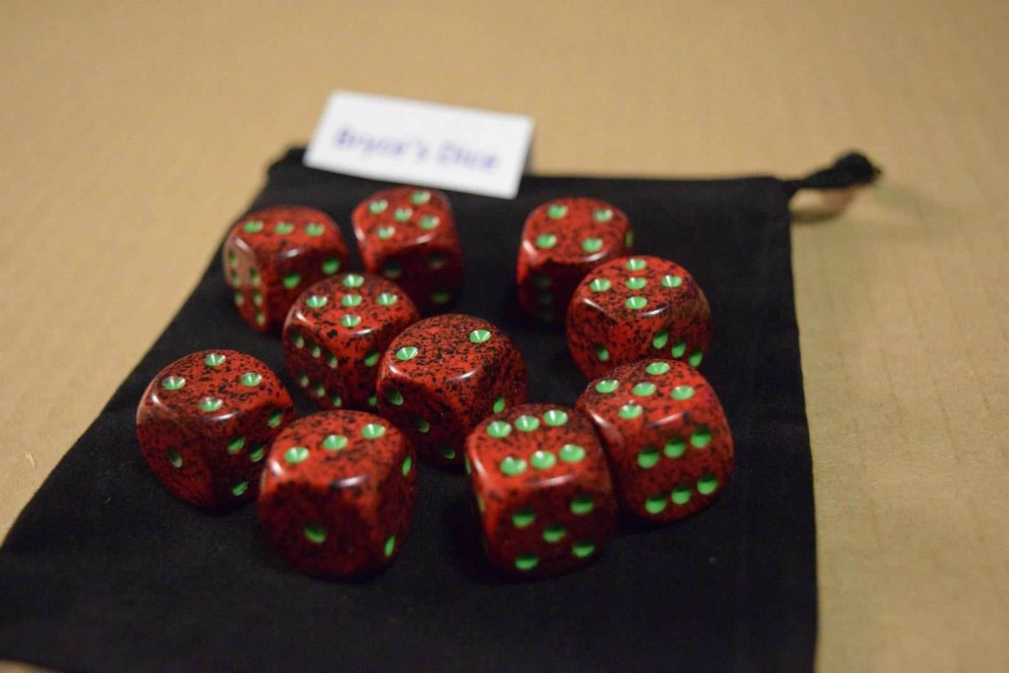 Strawberry Speckled 16mm D6 Pipped | Red/Black/Green (sold per piece) -