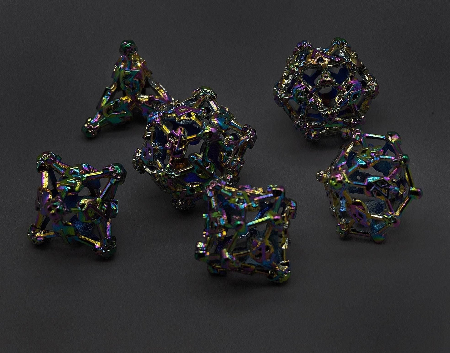 Rainbow Metal Deadly Skull Dice Hollow Metal 7-Dice Set - 7-Dice Set