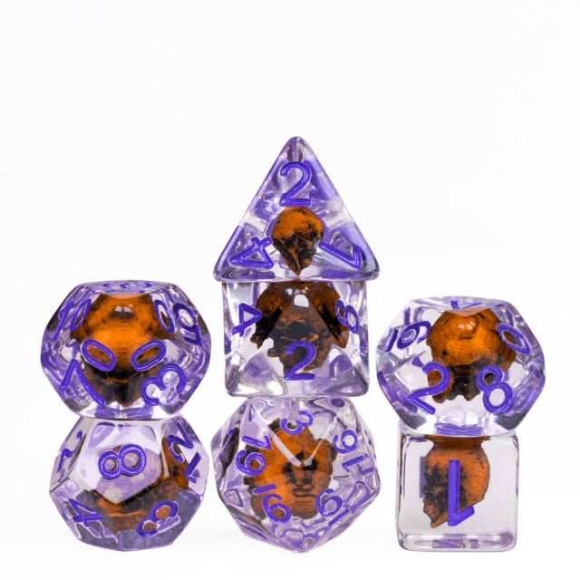 Orange Skull Dice | Clear RPG 7-Dice Set w/ Purple Numbers -