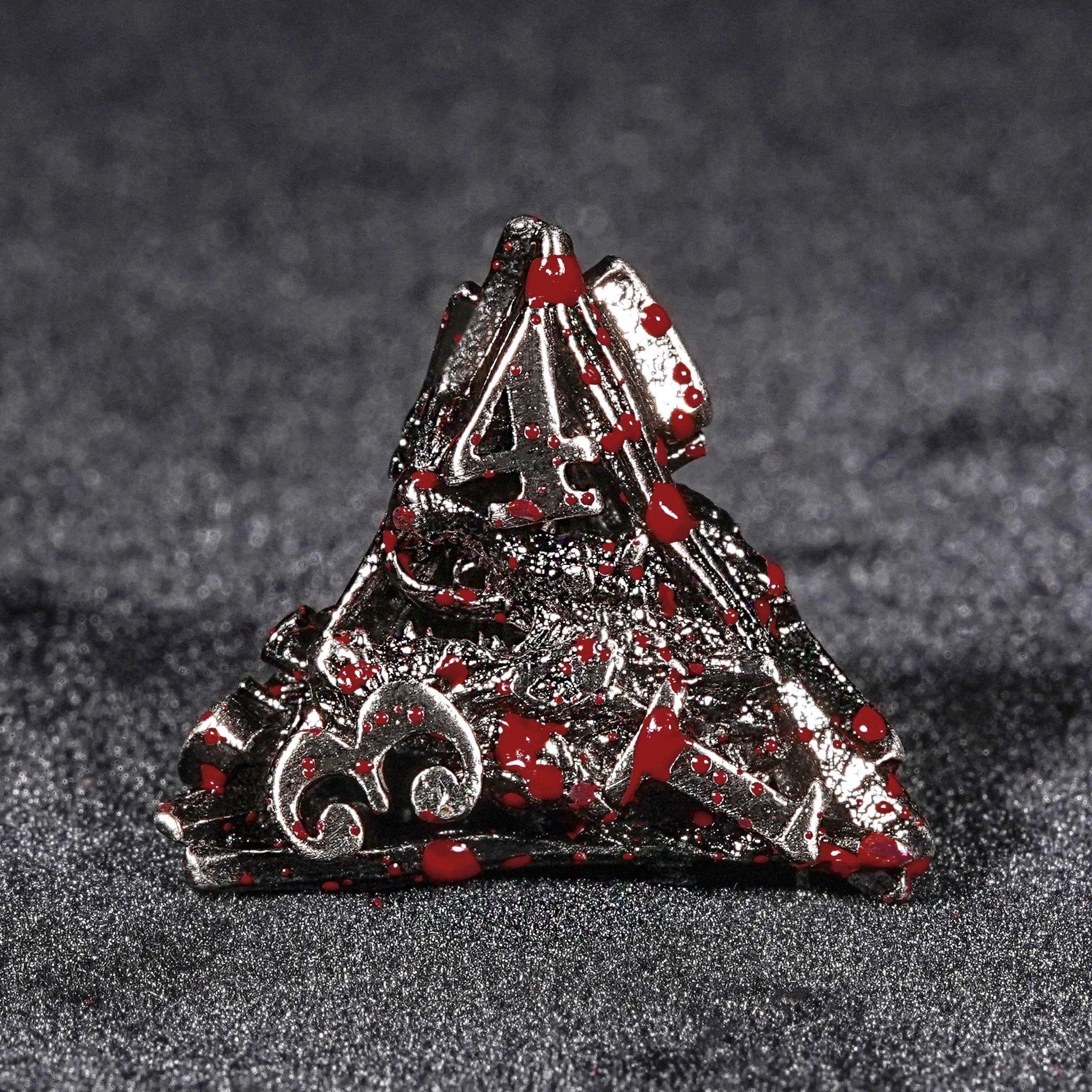 Bloodstained dragon head shaped metal hollow DND dice set