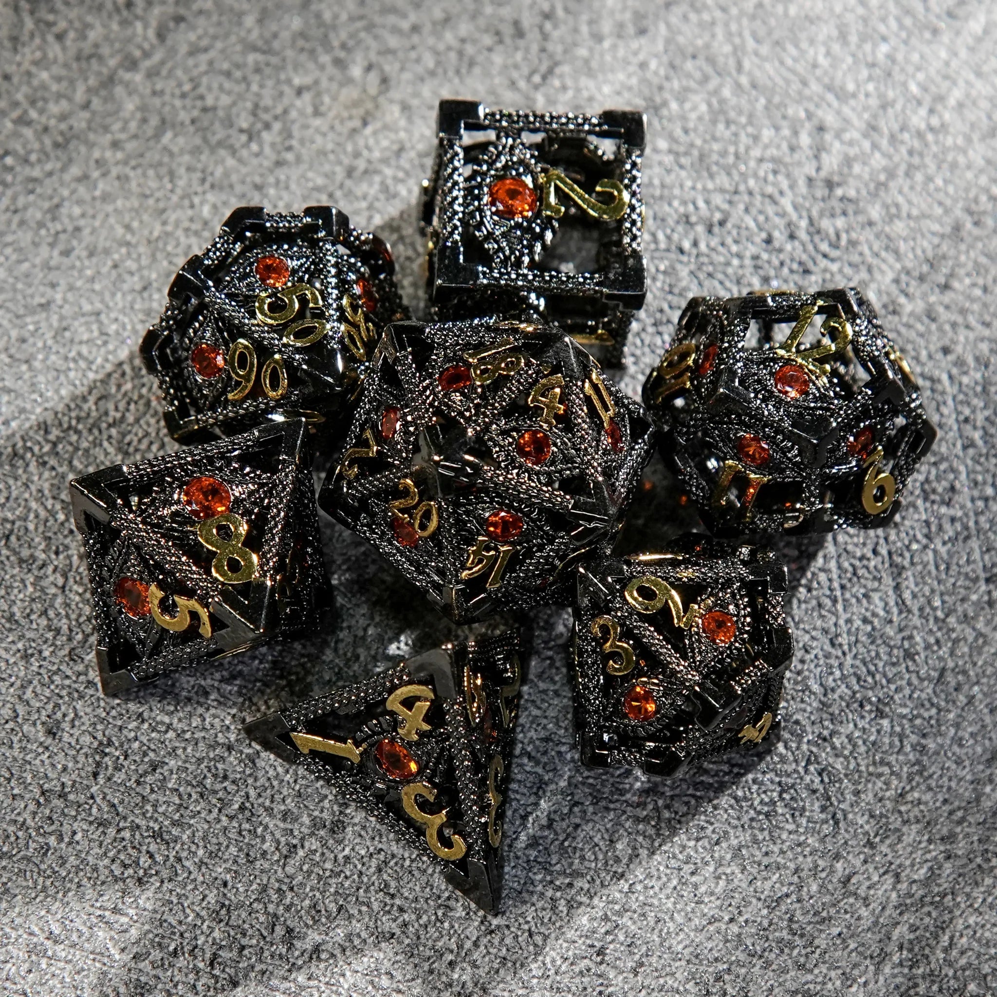Devil's Eye Ruby Metal Hollow DND Dice Set with Gold Numbers