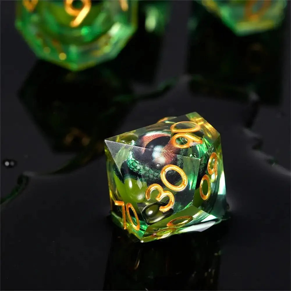 Fierce Crocodile Eyes Liquid Core Resin DND Dice Set + Gold Lettering
