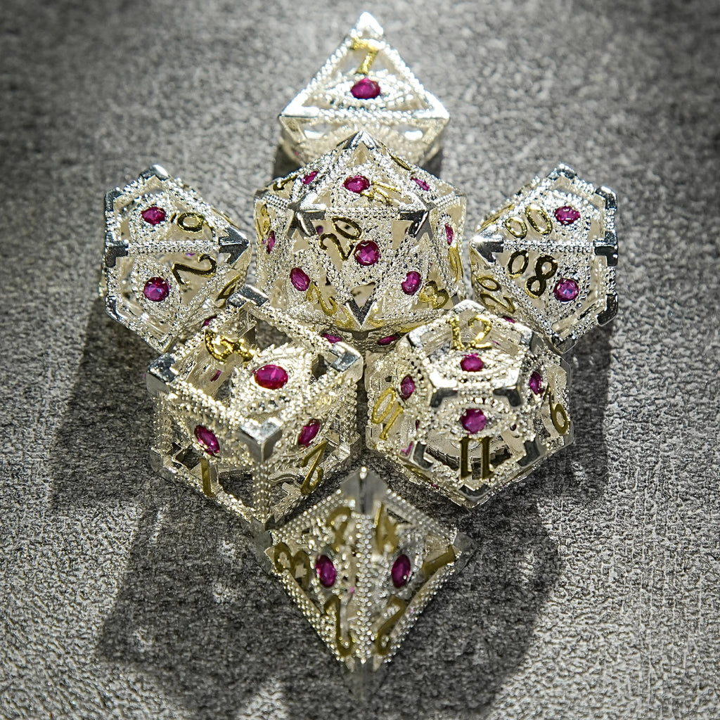 Silver with Pink Gems Dragon's Eye Hollow Metal RPG dice set